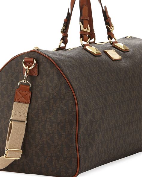 black michael kors duffle bag|michael kors travel bag outlet.